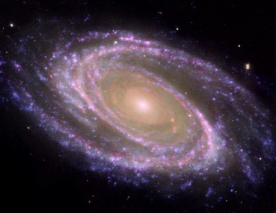 1429114089_m81-galaxy-is-pretty-in-pink.jpg